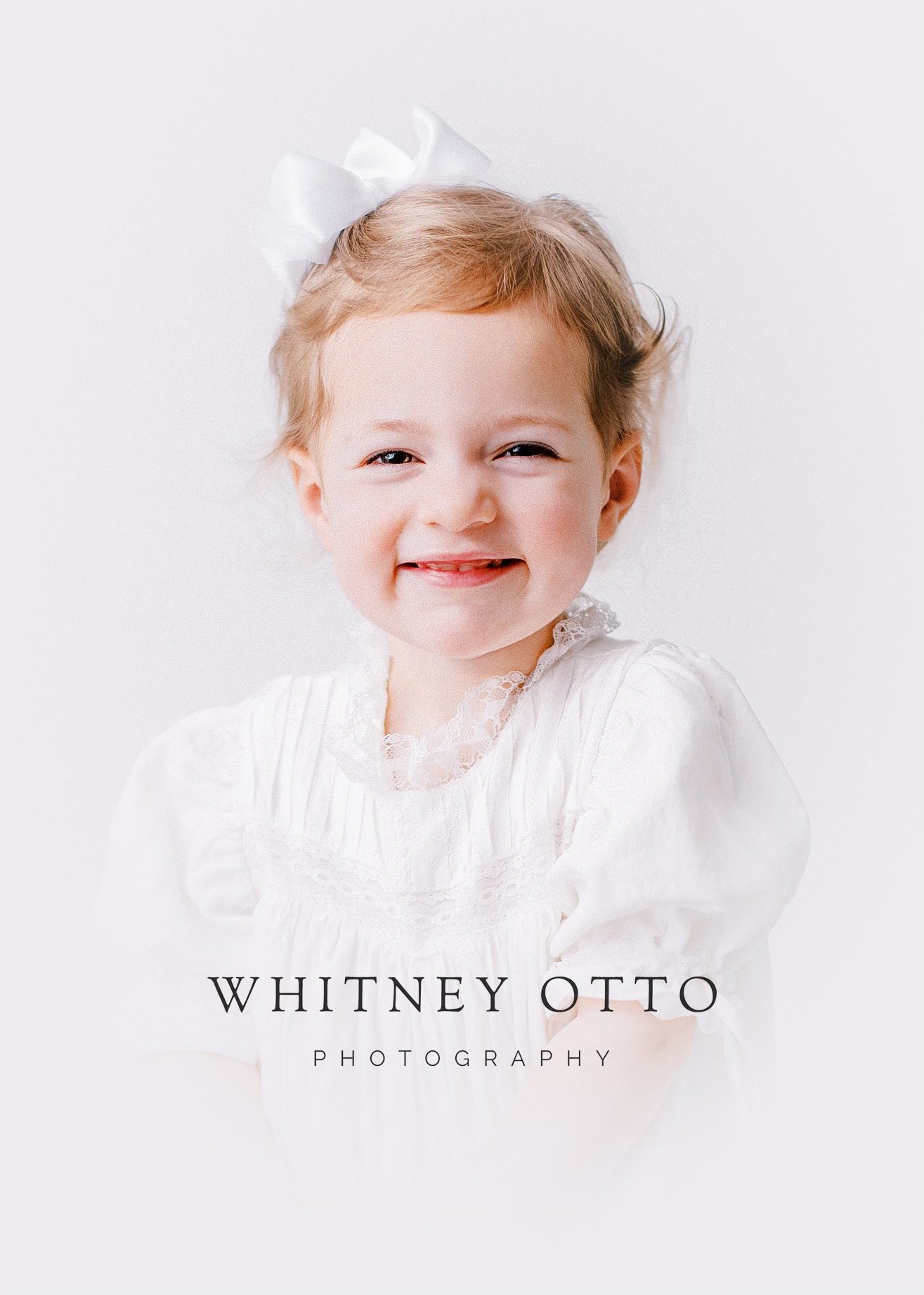heirloom portrait little girl smiling with bow